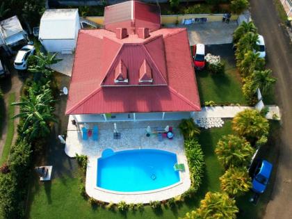 Appartement de 2 chambres avec piscine partagee jardin clos et wifi a Sainte Rose