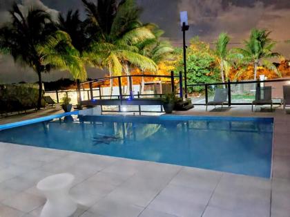 Bungalow de 2 chambres avec piscine partagee jacuzzi et jardin clos a Le Moule - image 4