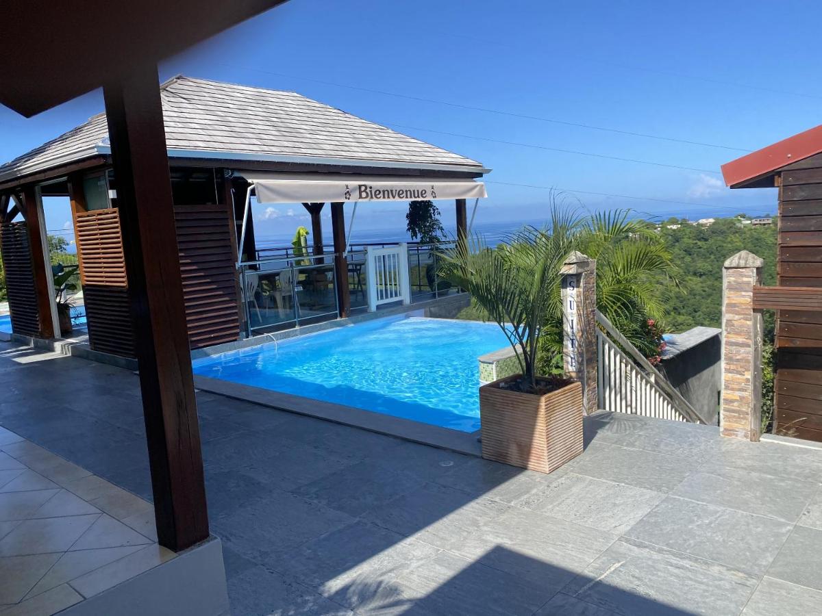 Bungalow d'une chambre avec vue sur la mer piscine partagee et terrasse a Marigot Vieux Habitants a 6 km de la plage - image 7