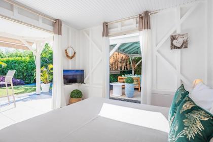 Magnifique Bungalow et Jacuzzi au cœur des plages - image 14