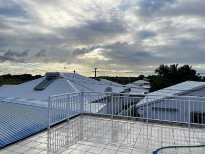 Maison de 2 chambres avec piscine partagee terrasse et wifi a Le Moule a 5 km de la plage - image 14