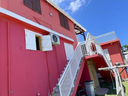 Maison de 2 chambres avec piscine partagee terrasse et wifi a Le Moule a 5 km de la plage - image 9