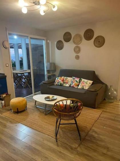 Logement cosy avec vue mer (photos disponibles)